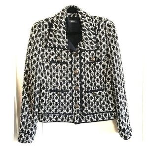 Per Se tweed iconic 4-pocket jacket.